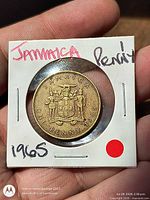 Obverse with Jamaican coat of arms and date