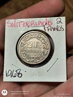 Reverse side of coin in 2x2 flip showing 2 Fr and date 1968 within wreath