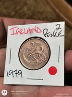 Obverse showing harp and date in flip