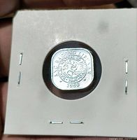Reverse side of 1980 Philippines 1 Sentimo coin in flip