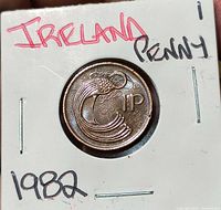 Obverse showing Celtic bird design and 1p