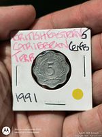 Reverse side of 1991 British Eastern Caribbean Territories 5 cents coin in 2×2 flip