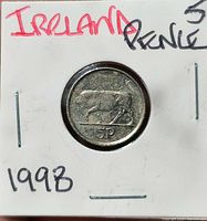 Reverse view in flip showing bull and 5p denomination