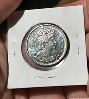 Obverse showing Queen Elizabeth II in holder