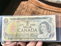 Obverse of 1973 Canadian $1 banknote showing serial ALK5526315, Queen Elizabeth II portrait