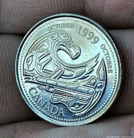 Reverse side showing Indigenous art design, OCTOBER 1999 legends