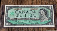 Obverse of 1967 Canadian $1 note showing serial number 8224975, denomination and Queen Elizabeth II portrait