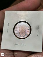 Obverse showing harp and date