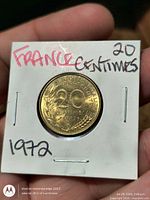 Reverse side showing 20 CENTIMES, date and wreath within holder