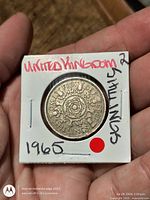 Reverse in flip showing Tudor rose and date 1965
