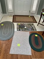 Overview of five mats laid out showing colors, shapes and sizes