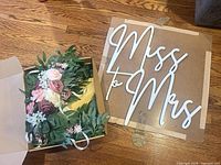 Overview of sign and faux flowers