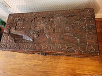 Top view showing full carved lid surface