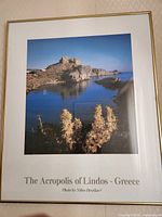 Framed photograph showing full artwork on wall
