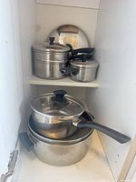Overall view of all cookware pieces on shelves