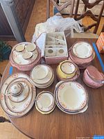 Full set on table showing variety of pieces