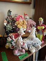 Group shot showing all clown figures and bench
