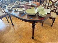 Full view of dining table with items on top