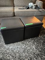 Front view of both black cube ottomans side by side