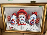 Full view of framed clown painting