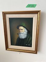 Full view of framed painting on wall