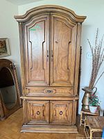 Full view of wardrobe cabinet showing overall design and condition