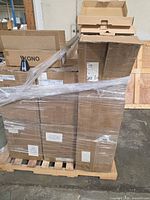 Shrink-wrapped pallet of Kono cartons