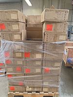 Full pallet of stacked KONO GK802 keycap boxes shrink-wrapped