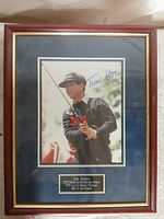 Full view of framed signed Tom Watson photograph with plaque