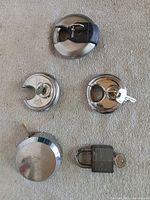 All five locks with their keys displayed