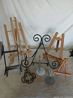 Group shot showing all eight display stands and easels