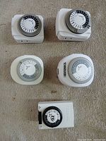 Group shot of all five plug-in outlet timers