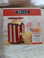 Front of boxed Bella Treats Series hot air popcorn maker