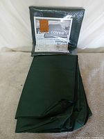 Sealed foam pad cover next to folded matching cover