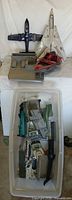 Overall lot with jets, boat, base panel and tote