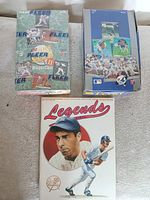 Group shot of both Fleer Ultra display boxes and Legends price guide