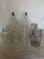 Group shot of all nine clear glass pieces showing relative sizes and types