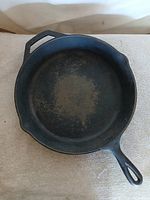 Full top view of Lodge 10SK skillet showing interior surface and both handles