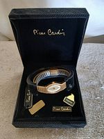 Watch with bracelet, tags and presentation box