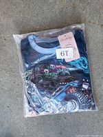 Packaged Barbeliya boys 6T monster truck graphic shirt showing tag and size label