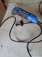 Overall view of Mastercraft blue/black corded oscillating multi-tool with cord