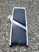 Top view of Sharper Image mandoline slicer showing entire unit and blade