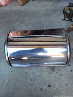 Closed stainless steel bread box showing exterior finish