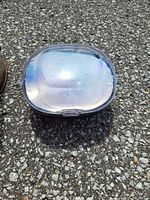 Top view of iridescent nail dryer showing crack and overall condition