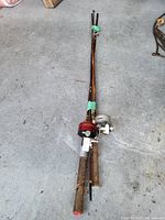 Both fishing rods side-by-side showing full length and attached reels