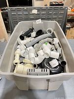 Full tote with assorted PVC and ABS fittings