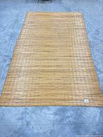 Full view of bamboo mat rug laid flat on floor