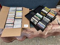 Both storage cases with tapes visible