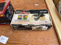 Closed Carlon Brite-Gard box showing product details and wear