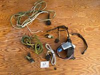 All harnesses laid out on wood surface showing connector types and quantity